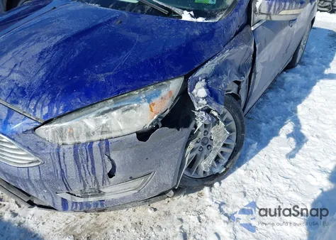 2015 Ford Focus Titanium z USA, uszkodzony, nr VIN 1FADP3J27FL323084